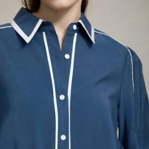 Camisa elegante con vivos a contraste